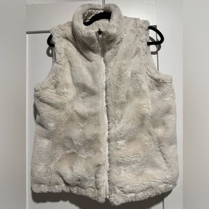 2 Reversible vests (fur & leather) - in black & white